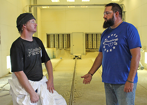 Powder Coat Painter Martin McQuade (left) and Scale Shop Manager Nate Dillon (right)